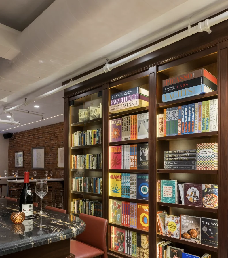 Bibliotheque bar with floor-to-ceiling bookshelves