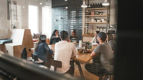 Client meeting around a table in a Manhattan office